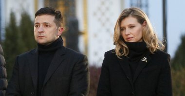 President Volodymyr Zelenskiy and his wife Olena pay tribute at a monument to victims of the Great Famine in Kyiv, Ukraine, Nov. 23, 2019.  (AP Photo)