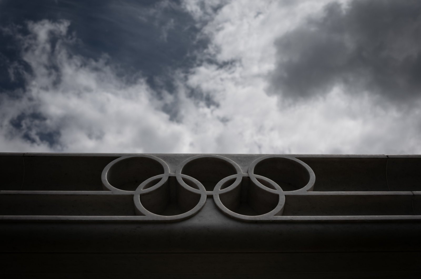 The Olympic rings logo at the entrance of the headquarters of the International Olympic Committee (IOC) in Lausanne, Switzerland, June 8, 2020. (AFP Photo)