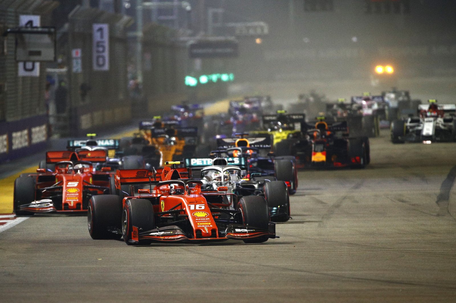 Ferrari driver Charles Leclerc in the lead during the Singapore Grand Prix race in Singapore, Sept. 22, 2019. (AP Photo)