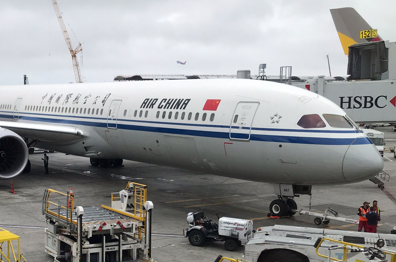 This May 24, 2018, file photo shows an Air China jet sitting at a gate at Los Angeles International Airport, Los Angeles. (AFP Photo)