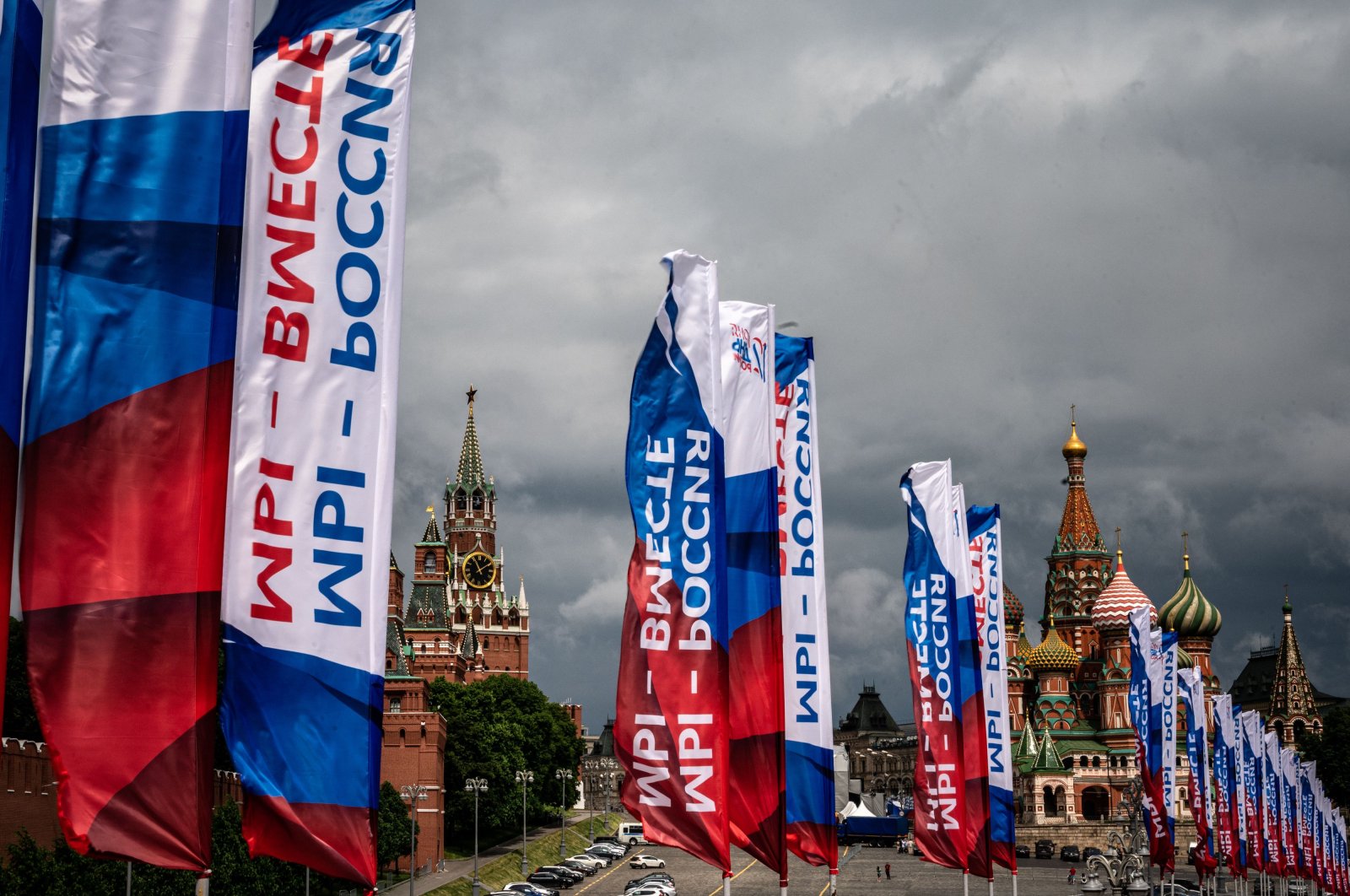 Russian banners devoted to Russia Day hang in front of the Kremlin in downtown Moscow, June 12, 2020. (AFP Photo)