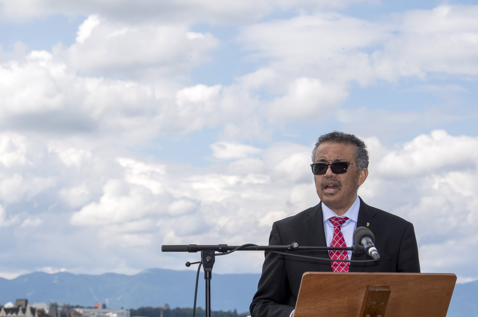 World Health Organization (WHO) Director-General, Tedros Adhanom Ghebreyesus, speaks during the relaunch ceremony of the famous fountain 'Le Jet d'Eau', which was postponed due to the coronavirus outbreak, in Geneva, Switzerland, June 11, 2020. (AP Photo)