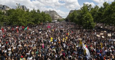 Thousands of people demonstrate against police brutality and racism in Paris, France, Saturday, June 13, 2020, prior to a march organized by supporters of Adama Traore, who died in police custody in 2016 in circumstances that remain unclear despite four years of back-and-forth autopsies. (AP Photo)