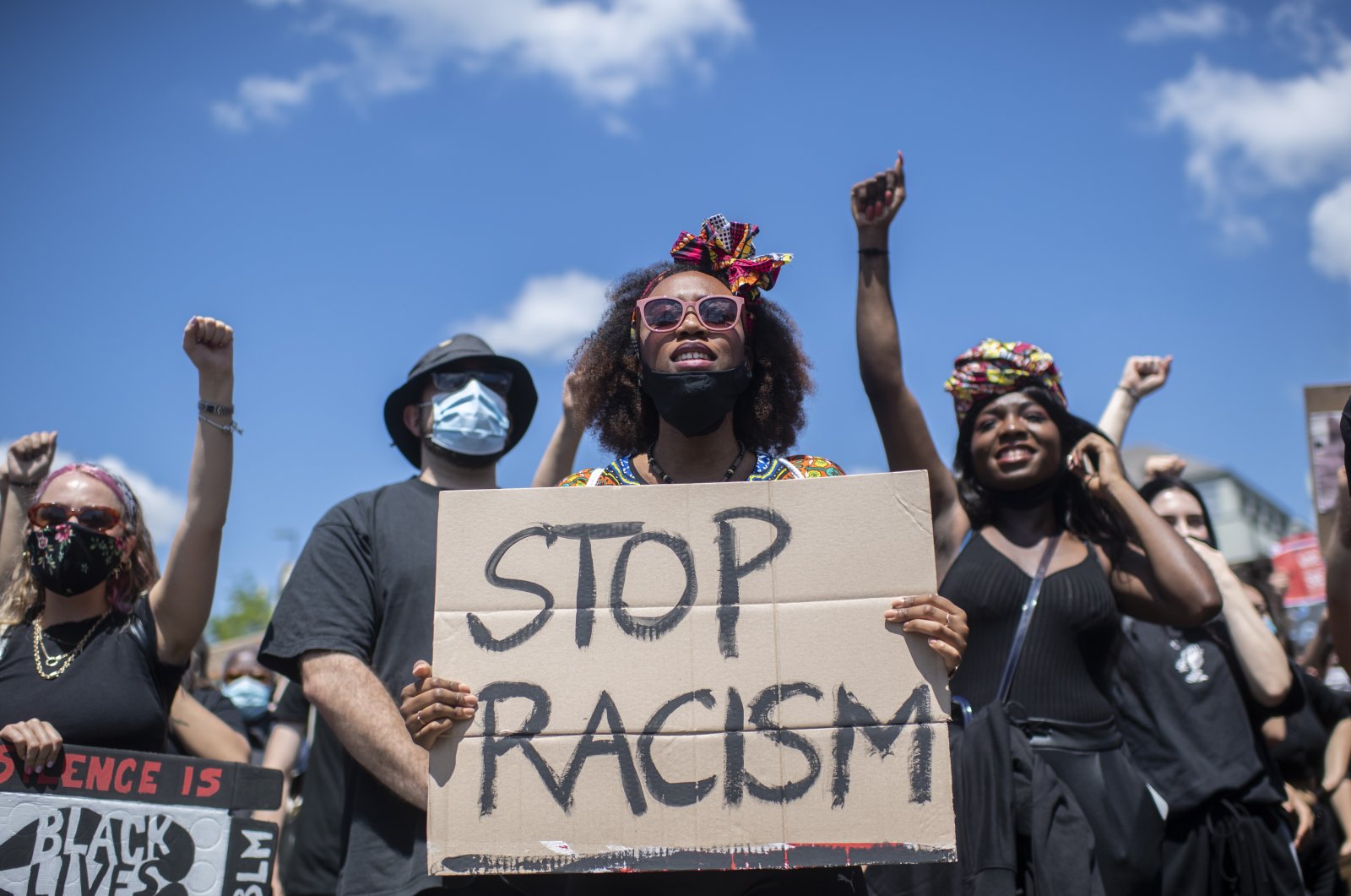 People demonstrate against racism after the worldwide movement of the Black Lives Matter (BLM) protest against the recent death of George Floyd in Zurich, Switzerland, June 13, 2020. (EPA Photo)