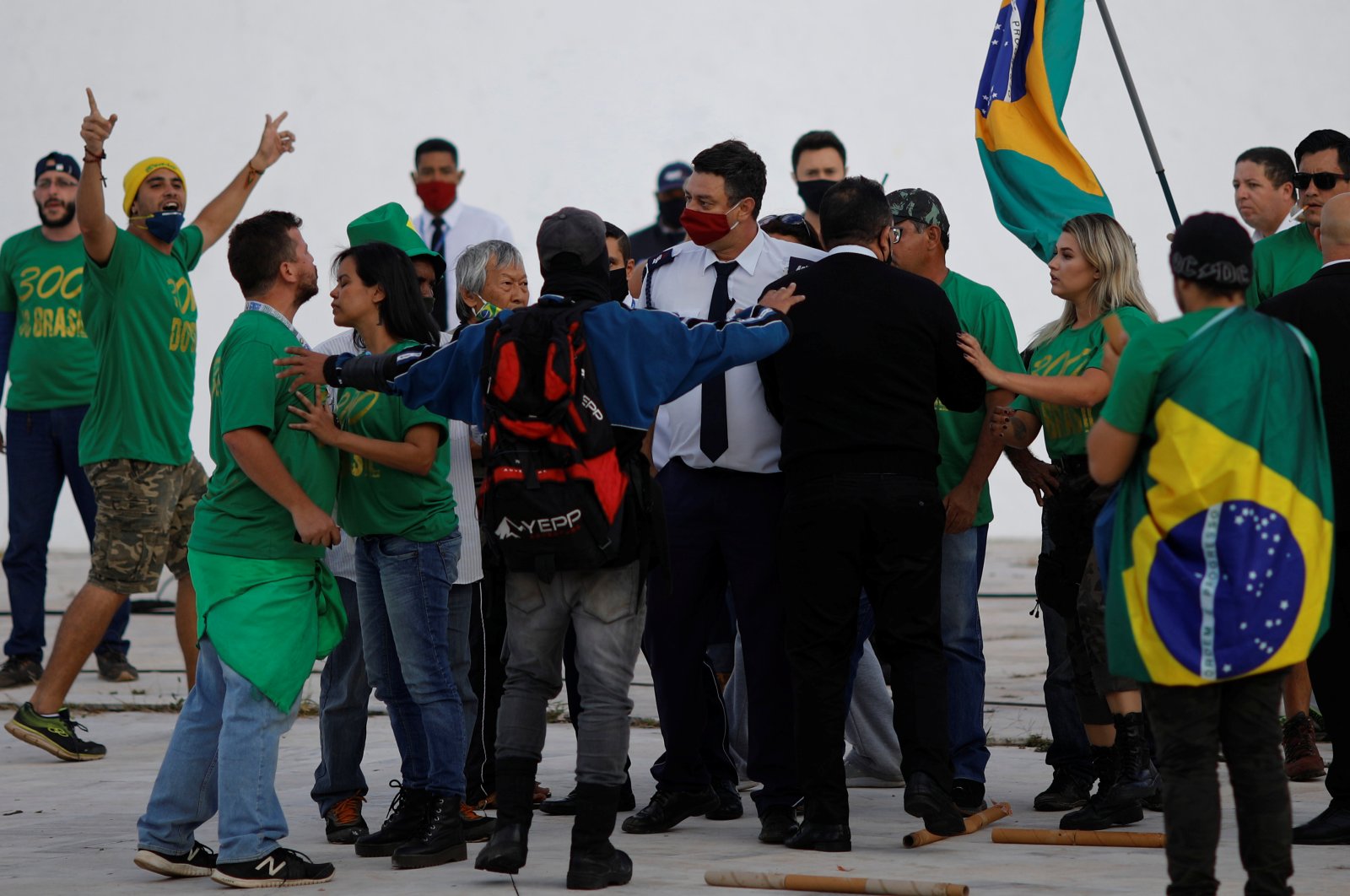 Demonstrators attend a protest against the National Congress and in support of the government of Brazil's President Jair Bolsonaro outside the National Congress building in Brasilia, Brazil June 13, 2020. (Reuters Photo)
