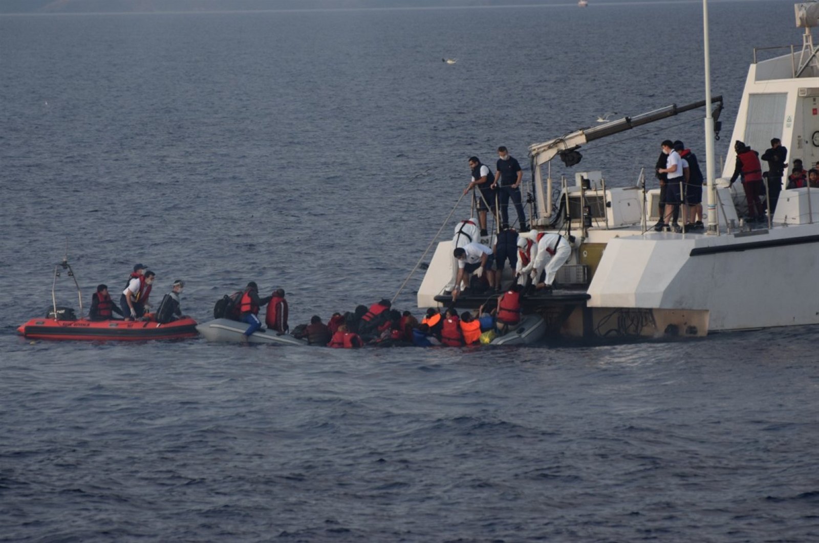 Turkish coast guard rescues asylum-seekers pushed back by Greece near western Çanakkale province in the Aegean Sea, June 13, 2020. (DHA)