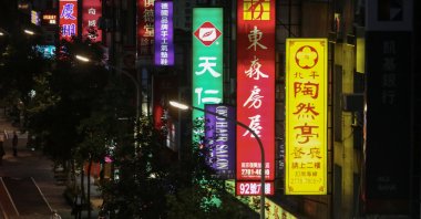 A man cycles past shops in Taipei, Taiwan, June 8, 2020. (Reuters Photo)