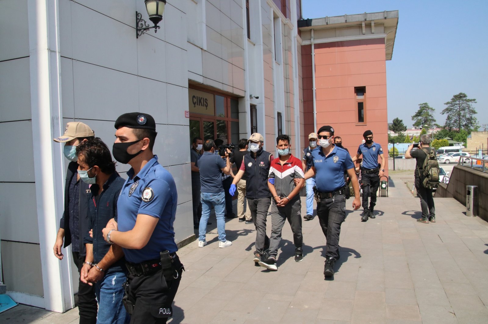 In this June 9, 2020, file photo police bring Daesh-linked terrorist suspects to a police station in northern Turkey's Düzce. (DHA File Photo)