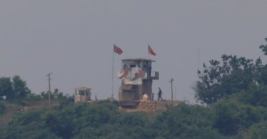 A North Korean soldier is seen beside his guard post inside North Korean territory in this picture taken near the demilitarized zone separating the two Koreas in Paju, South Korea, June 16, 2020. (Reuters Photo)