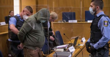 Markus H., who is accused of aiding and abetting in murdering politician Walter Luebcke, arrives for the first day of his trial at the Oberlandgericht Frankfurt courthouse on June 16, 2020. (AFP Photo)