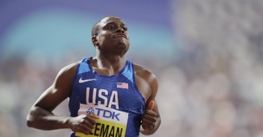 Christian Coleman warms up before the men's 100-meter semifinal at the World Athletics Championships in Doha, Qatar, Sept. 28, 2019. (AP Photo)