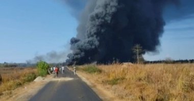 Smoke billows from an oil well in Tinsukia, Assam, India, June 9, 2020.