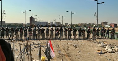 Security forces close the bridge leading to the Green Zone during a demonstration, Baghdad, Oct. 26, 2019. (AP Photo)