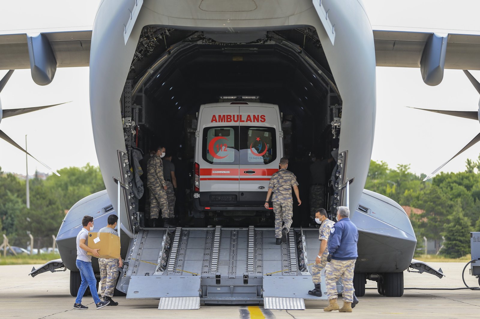 A Turkish Armed Forces (TSK) aircraft carrying a second batch of medical supplies and an ambulance prepares to depart Ankara for Chad to aid in the fight against COVID-19, June 18, 2020. (AA Photo)