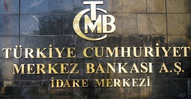 A logo of the Central Bank of the Republic of Turkey is pictured at the entrance of the bank's headquarters in Ankara, Turkey, April 19, 2015. (Reuters Photo)