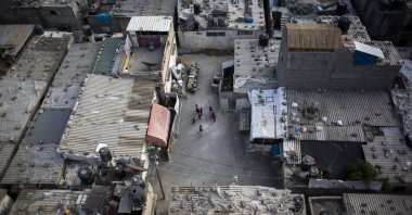 Palestinian children play in the Jabaliya refugee camp on World Refugee Day in northern Gaza Strip, June 20, 2020. (AP Photo)