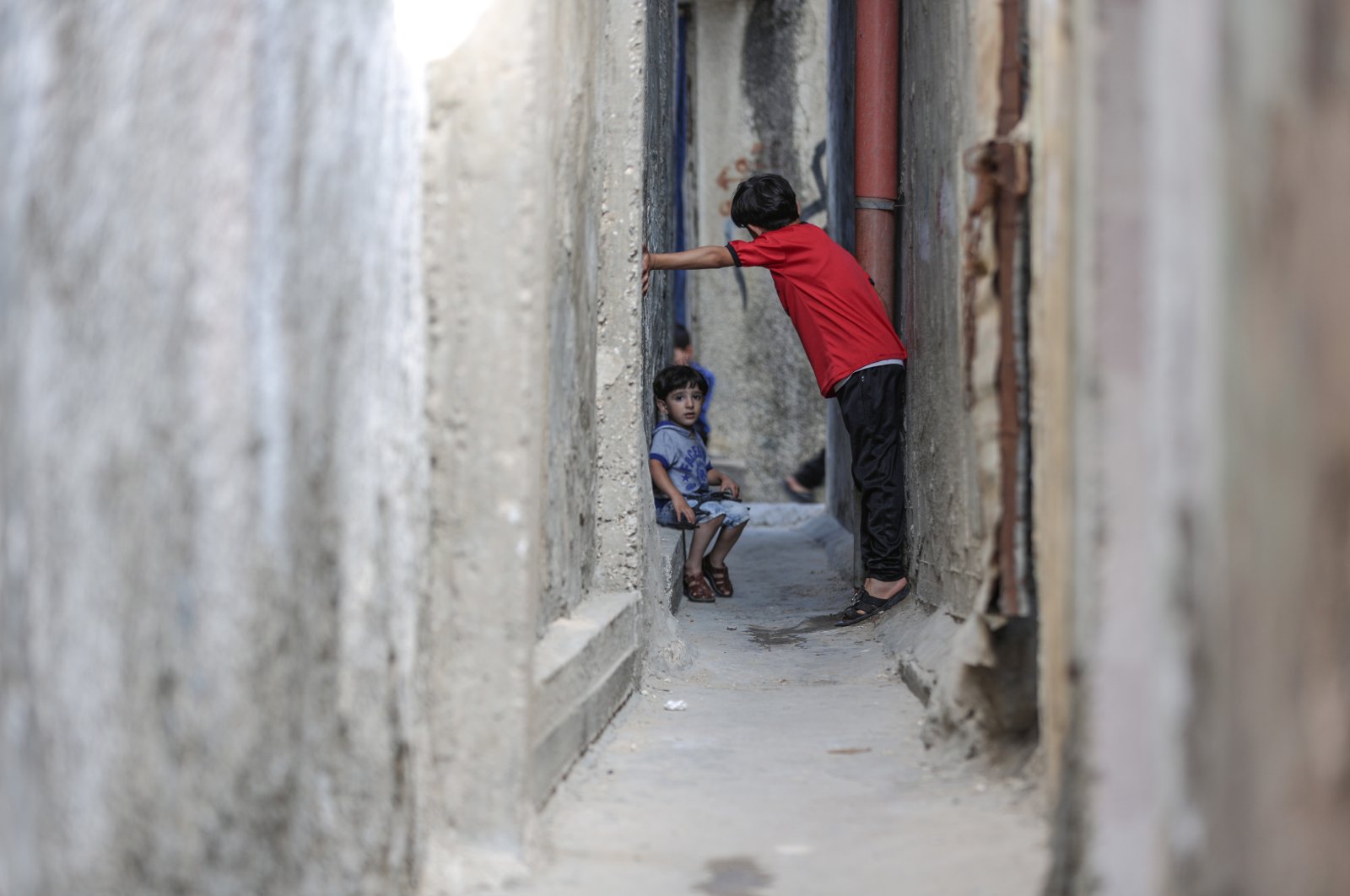 Two Palestinian children are seen in Jabalia refugee camp, Gaza Strip, Palestine, June 21, 2020. (AA Photo)