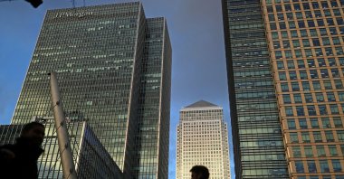 People walk through the Canary Wharf financial district of London, Britain, Dec. 7, 2018. (Reuters Photo)