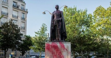 The statue of Hubert Lyautey, who served in Morocco, Algeria, Madagascar and Indochina when they were under French control, is daubed with red painting, Paris, June 22, 2020. (AP Photo)