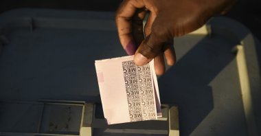 Residents queue to cast their votes in Blantyre, Malawi, June 23 2020. (AP Photo/Thoko Chikondi)