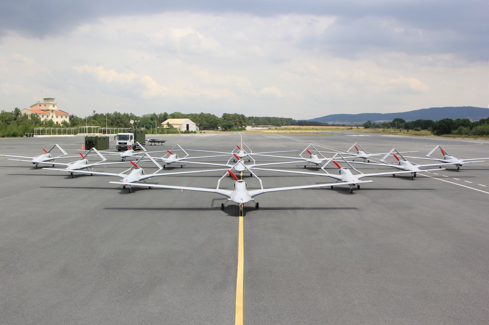 Bayraktar TB2 unmanned aerial vehicles (UAVs) are seen parked at an airfield in Istanbul, June 11, 2020. (AA Photo)