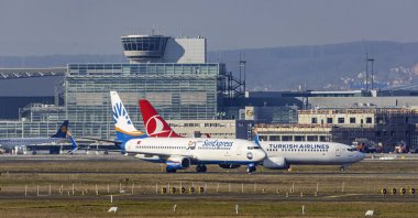 A SunExpress aircraft is seen beside a Turkish Airlines plane at Frankfurt Airport, Germany, Feb. 7, 2020. (Reuters Photo)