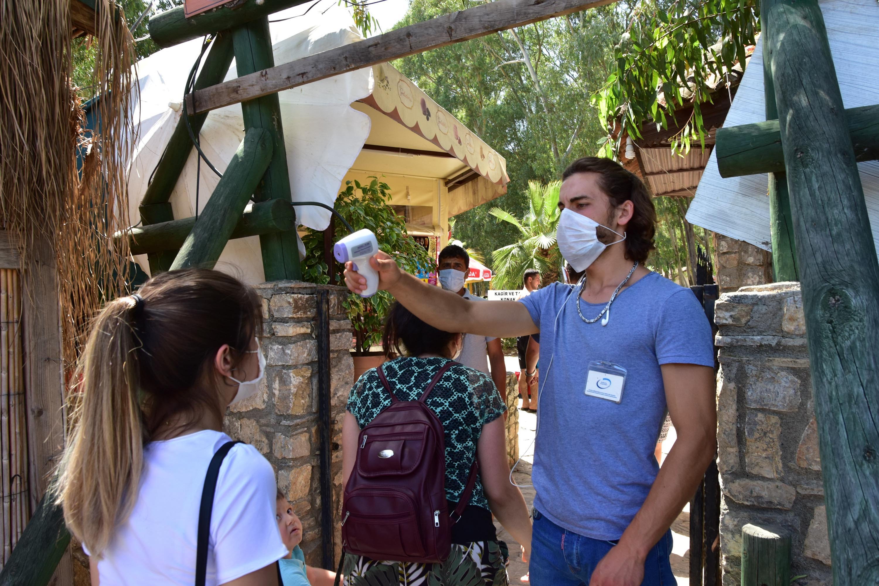 Campsites in Muğla are making sure all visitors wear masks upon entrance and are checking guests