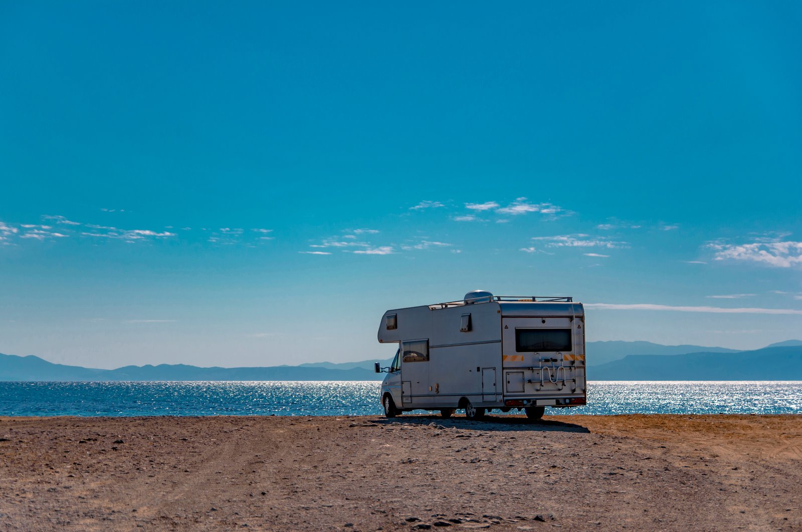Park your car or caravan in the designated camping areas and then go for a swim in Ayvalık. (Shutterstock Photo)