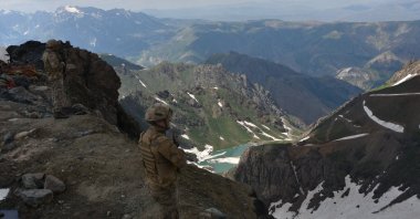 Turkish security officers guard a border base established to counter the threat of PKK terrorism, in the Yüksekova district of Hakkari province, southeastern Turkey, June 24, 2020. (AA photo)