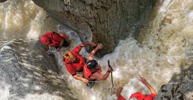 Search and rescue crews comb a river to find Derya Bilen, in Bursa, Turkey, June 24, 2020. (İHA Photo) 