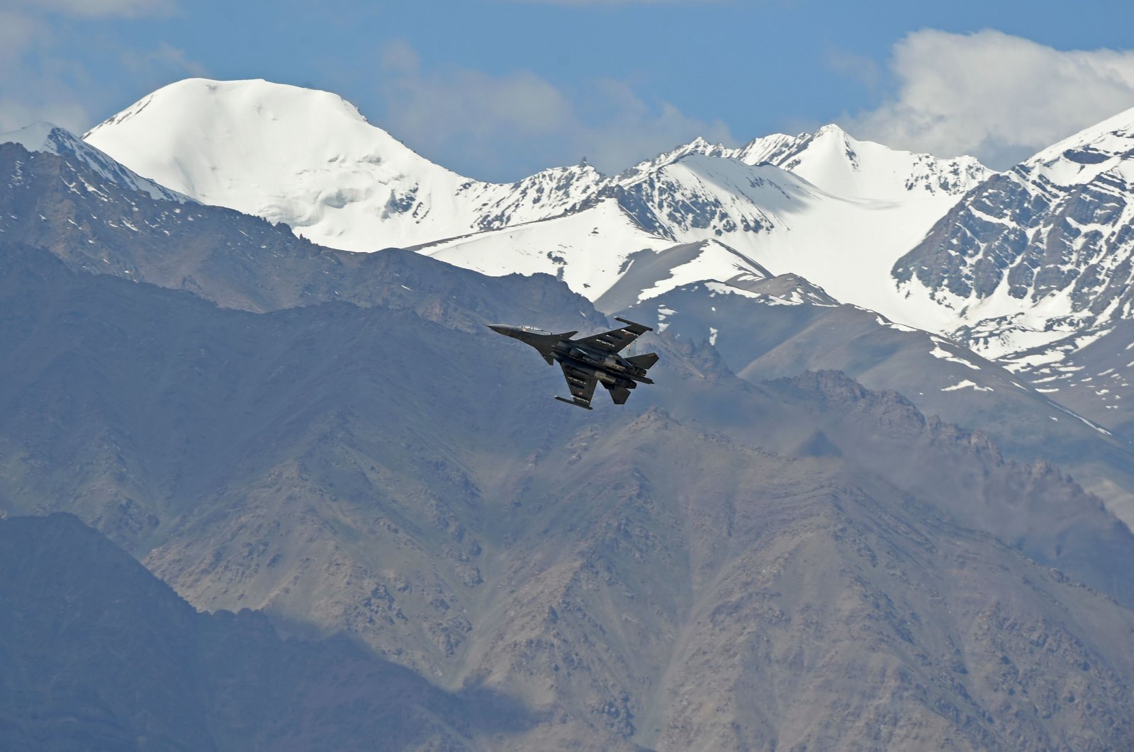 An Indian fighter jet flies over Leh, the joint capital of the union territory of Ladakh, June 26, 2020. (AFP Photo)