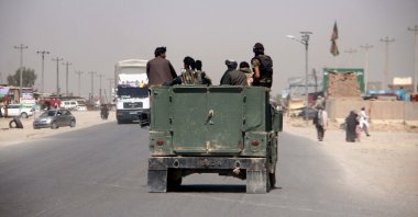 Afghan security officials patrol on a highway in Helmand, Afghanistan, June 14, 2020. (EPA Photo)