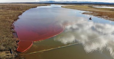 This handout photograph taken and released by the Marine Rescue Service of Russia shows a large diesel spill in the Ambarnaya River outside Norilsk, Russia, June 3, 2020. (AFP Photo / Marine Rescue Service of Russia)