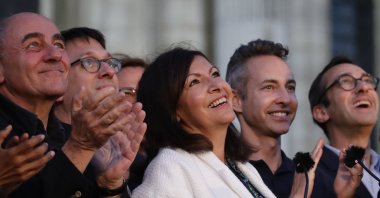 Paris Mayor Anne Hidalgo (C) looks up after her victorious second round of the municipal election, Paris, France, June 28, 2020. (AP Photo)