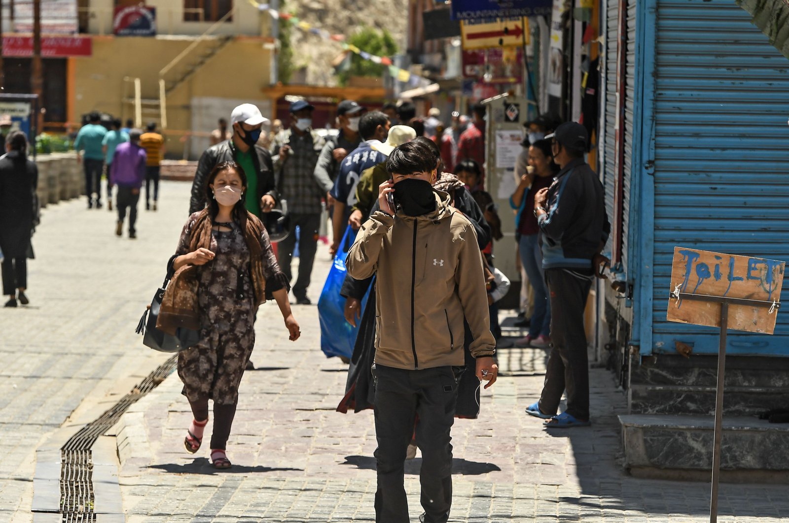 People walk at a market in Leh, the joint capital of the union territory of India's Ladakh, June 27, 2020. (AFP Photo)