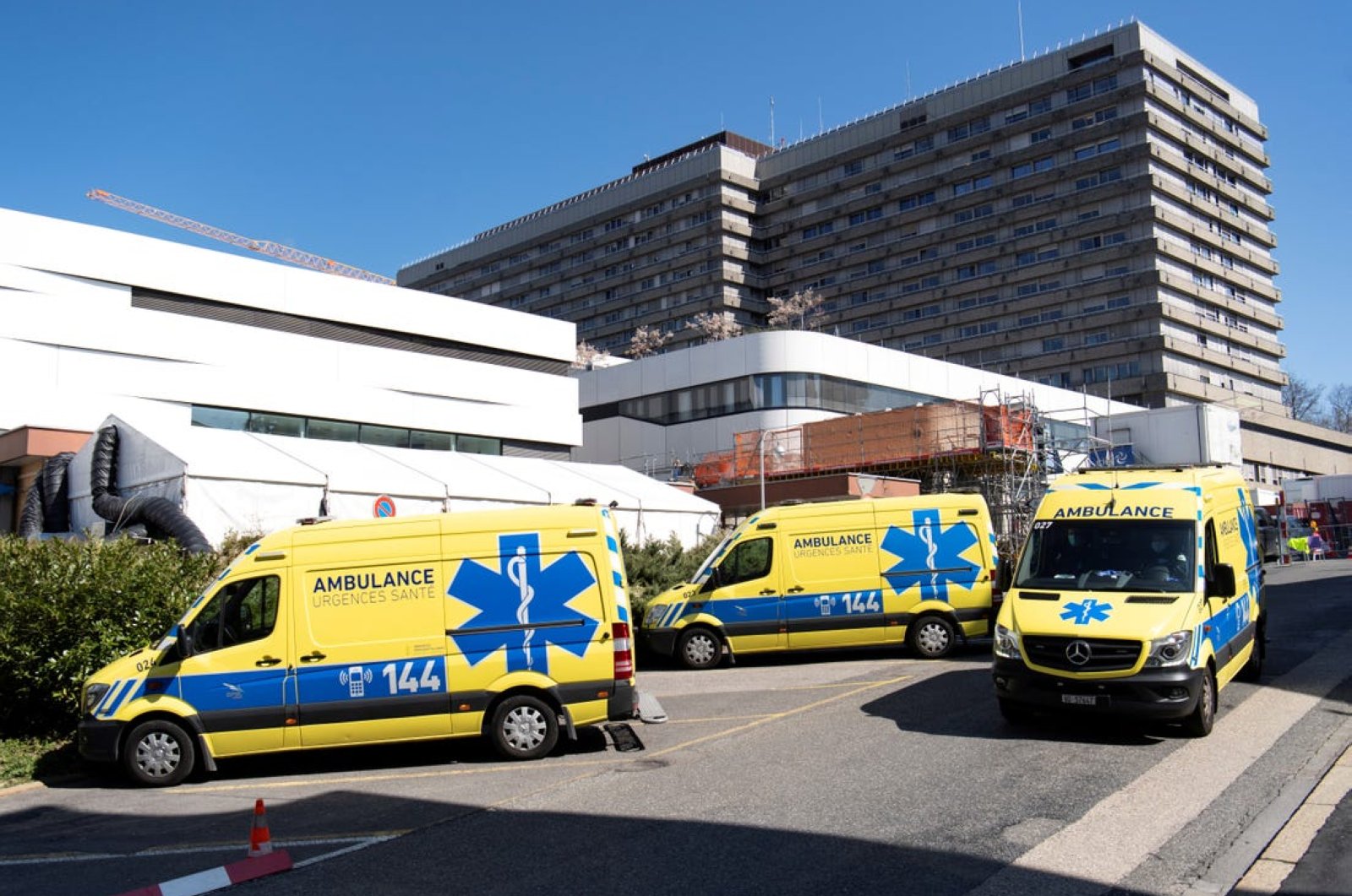 Ambulances are parked in front of a temporary space for patients at a hospital in Switzerland's Lausanne in this undated photo. (Reuters File Photo)