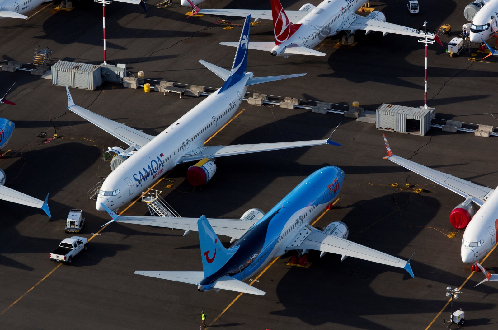 Boeing 737 Max aircraft are parked in a parking lot at Boeing Field in this aerial photo over Seattle, Washington, U.S., June 11, 2020. (Reuters Photo)