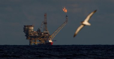A seagull flies in front of an oil platform in the Bouri Oilfield some 70 nautical miles north of the coast of Libya, October 5, 2017. ( REUTERS Photo)