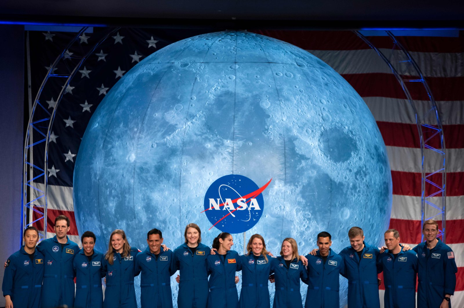 In this file photo taken on Jan. 10, 2020, NASA and Canadian Space Agency (CSA) astronauts acknowledge the audience after their graduation ceremony at Johnson Space Center in Houston Texas. (AFP Photo)