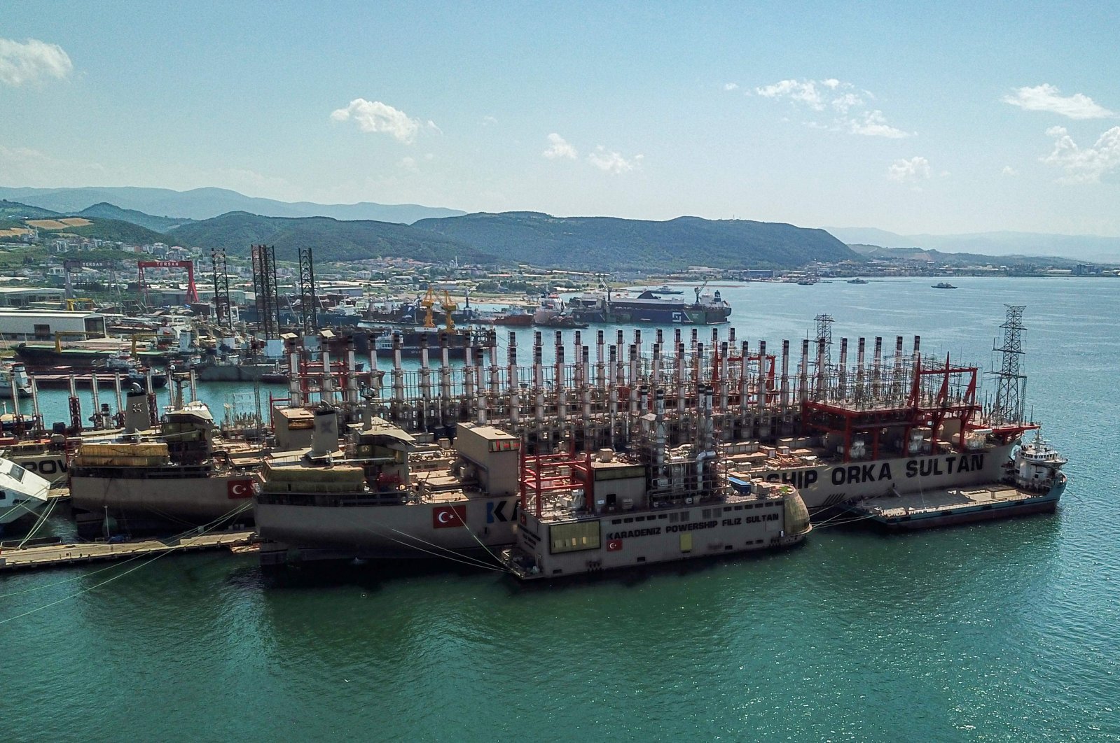 The powerships Orca Sultan (front) and Raif Bey (back) are seen docked in a shipyard in Altinova district, Yalova, Turkey, June 16, 2020. (AFP Photo)