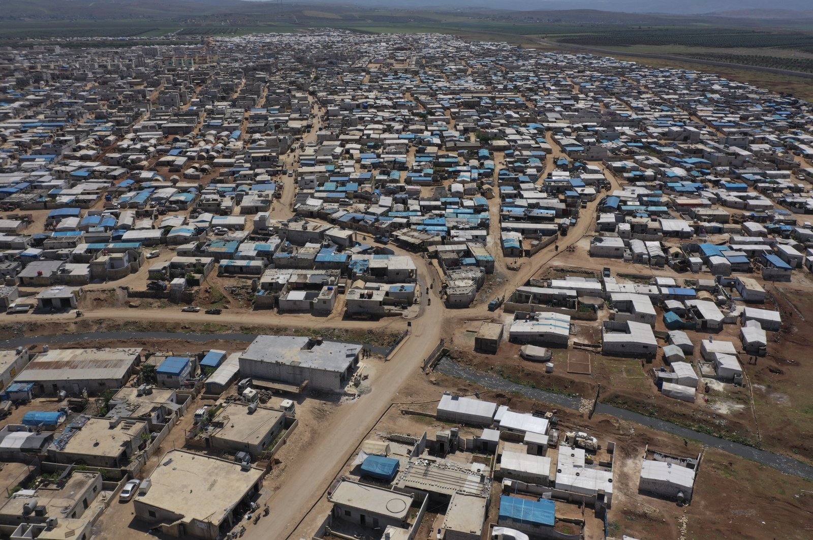 A large refugee camp on the Syrian side of the border with Turkey, near the town of Atma, in Idlib province, April 19, 2020. (AP)