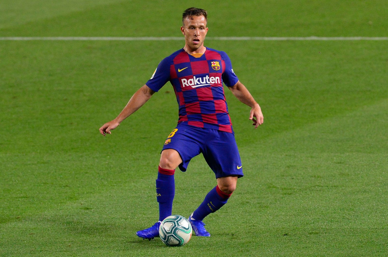 Barcelona's Brazilian midfielder Arthur controls the ball during the Spanish league football match between FC Barcelona and Athletic Club Bilbao at the Camp Nou stadium in Barcelona, June 23, 2020. (AFP Photo)