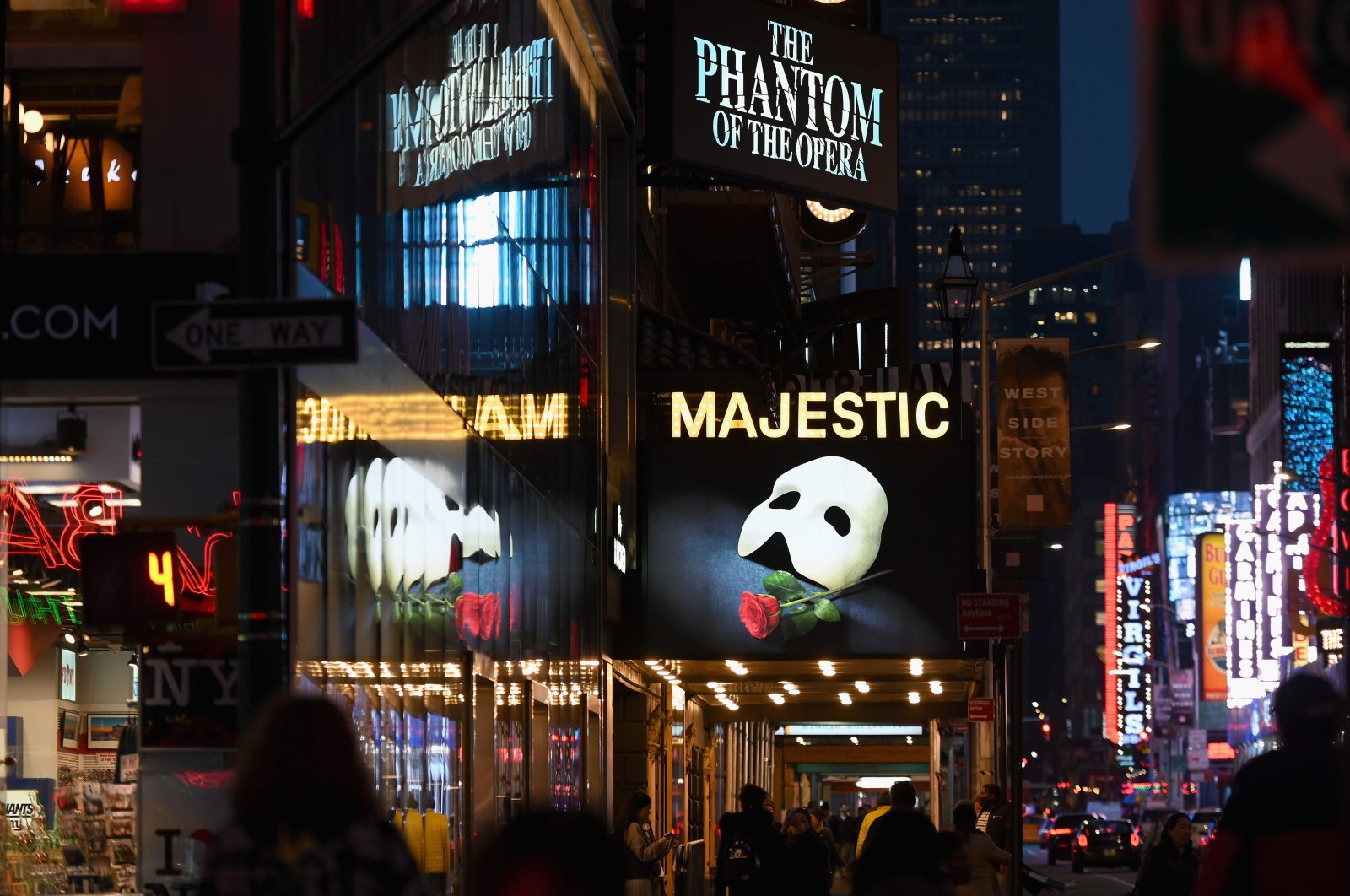 In this file photo signage of the Broadway play "The Phantom of the Opera" is seen at Time Square, New York City, U.S. March 12, 2020 (AFP Photo)