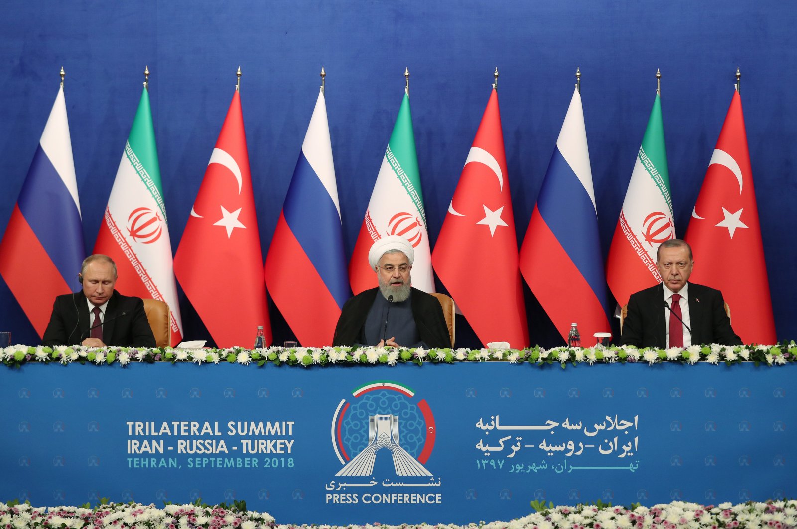 Russian President Vladimir Putin (L), Iranian President Hassan Rouhani (C) and President Recep Tayyip Erdoğan attend a trilateral summit in Tehran, Iran, Sept. 8, 2019. (AA File Photo)