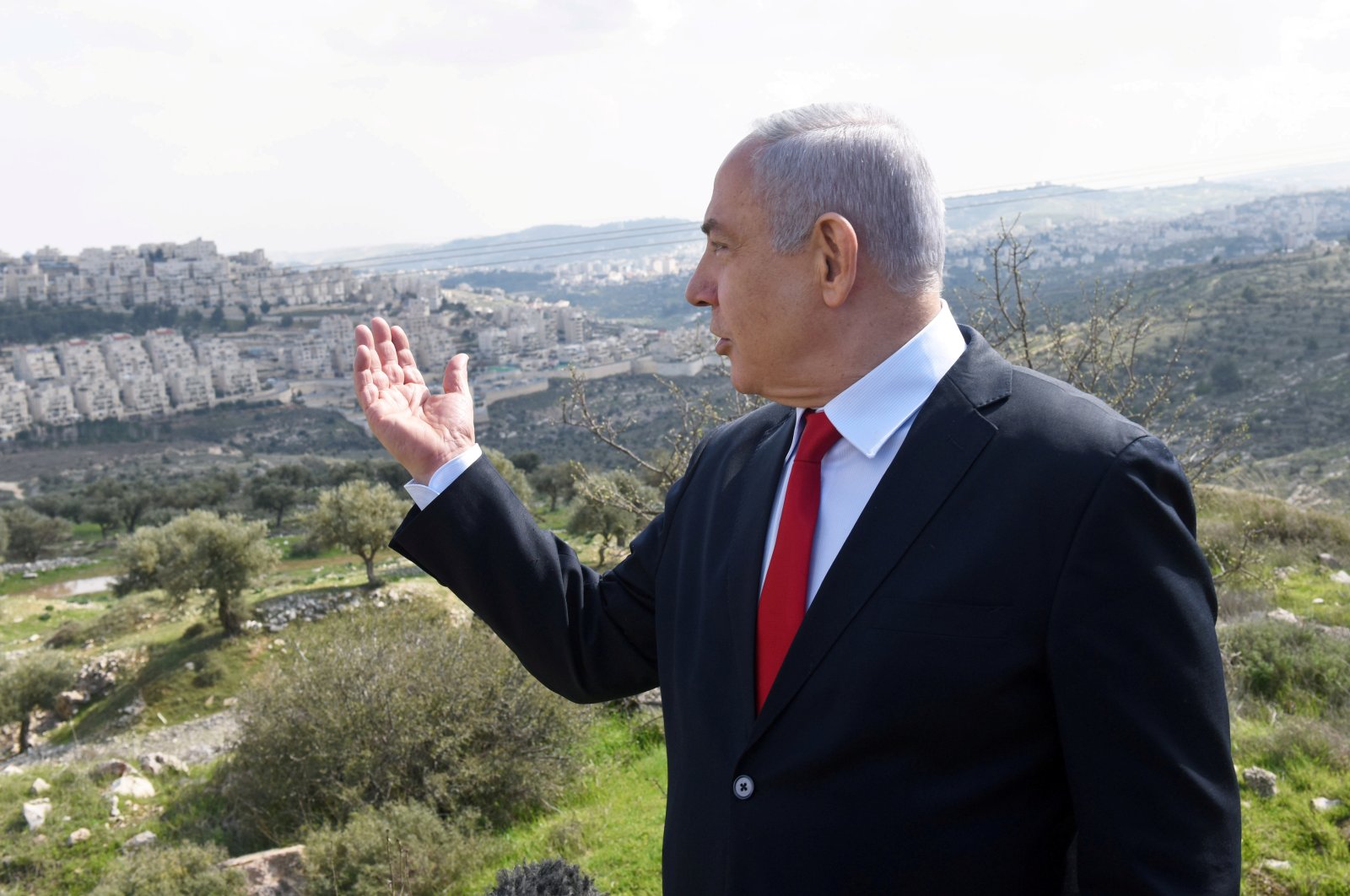Israeli Prime Minister Benjamin Netanyahu delivers a statement overlooking the Israeli settlement of Har Homa, located in an area of the Israeli-occupied West Bank, Feb. 20, 2020. (REUTERS Photo)
