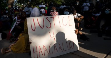 People gather during a protest of the death of musician and activist Haacaaluu Hundeessaa outside the Governor's Mansion in St. Paul, Minnesota, U.S., June 30, 2020. (AFP Photo)