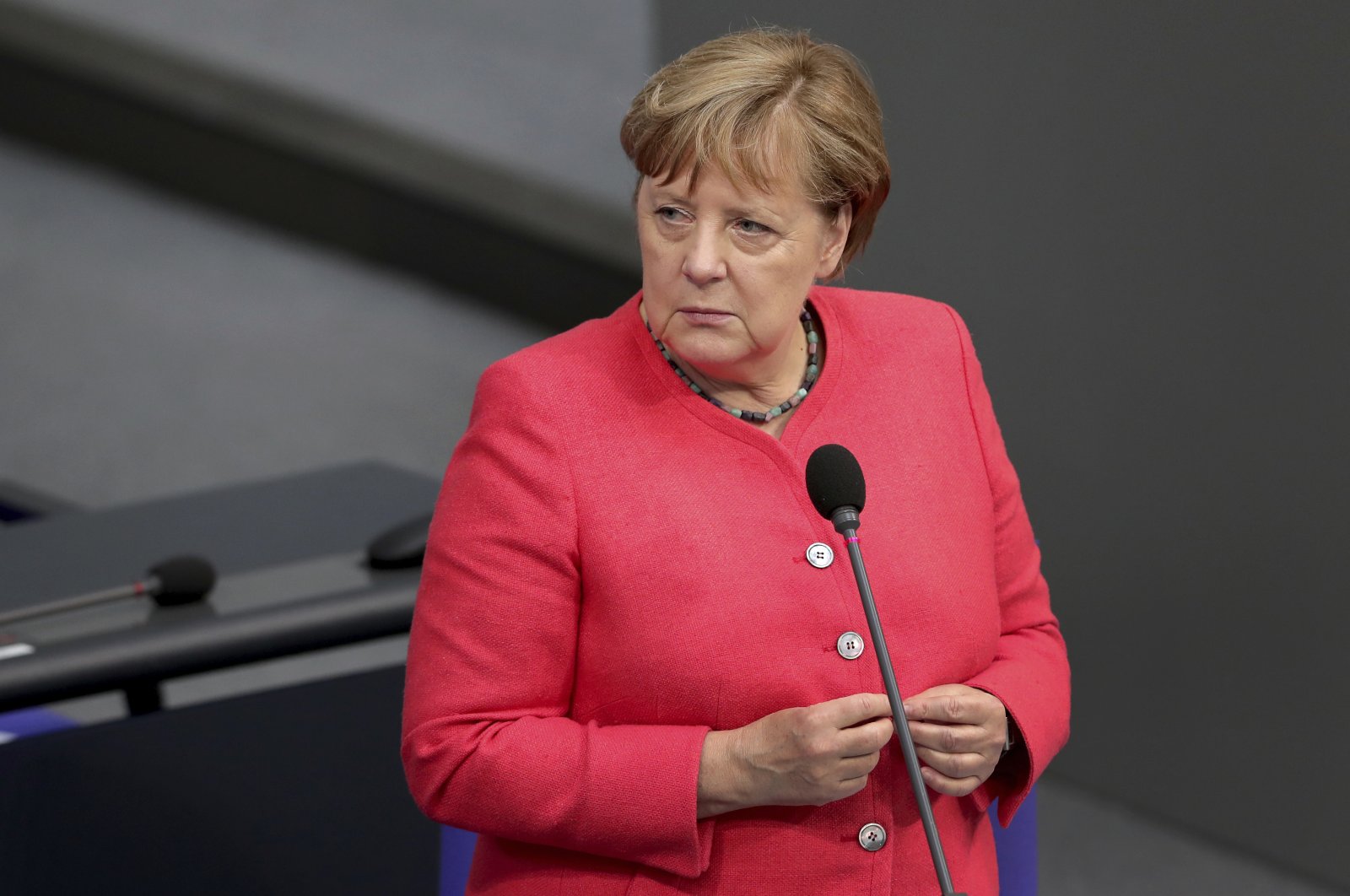 German Chancellor Angela Merkel takes questions from a deputy of the far-right Alternative for Germany party during a meeting of the German federal parliament, the Bundestag, at the Reichstag building, Berlin, Germany, July 1, 2020. (AP Photo)