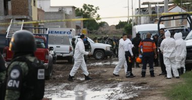 Members of the National Guard and forensic investigators work near a drug rehabilitation center in Irapuato, Mexico, July 1, 2020. (AP Photo)