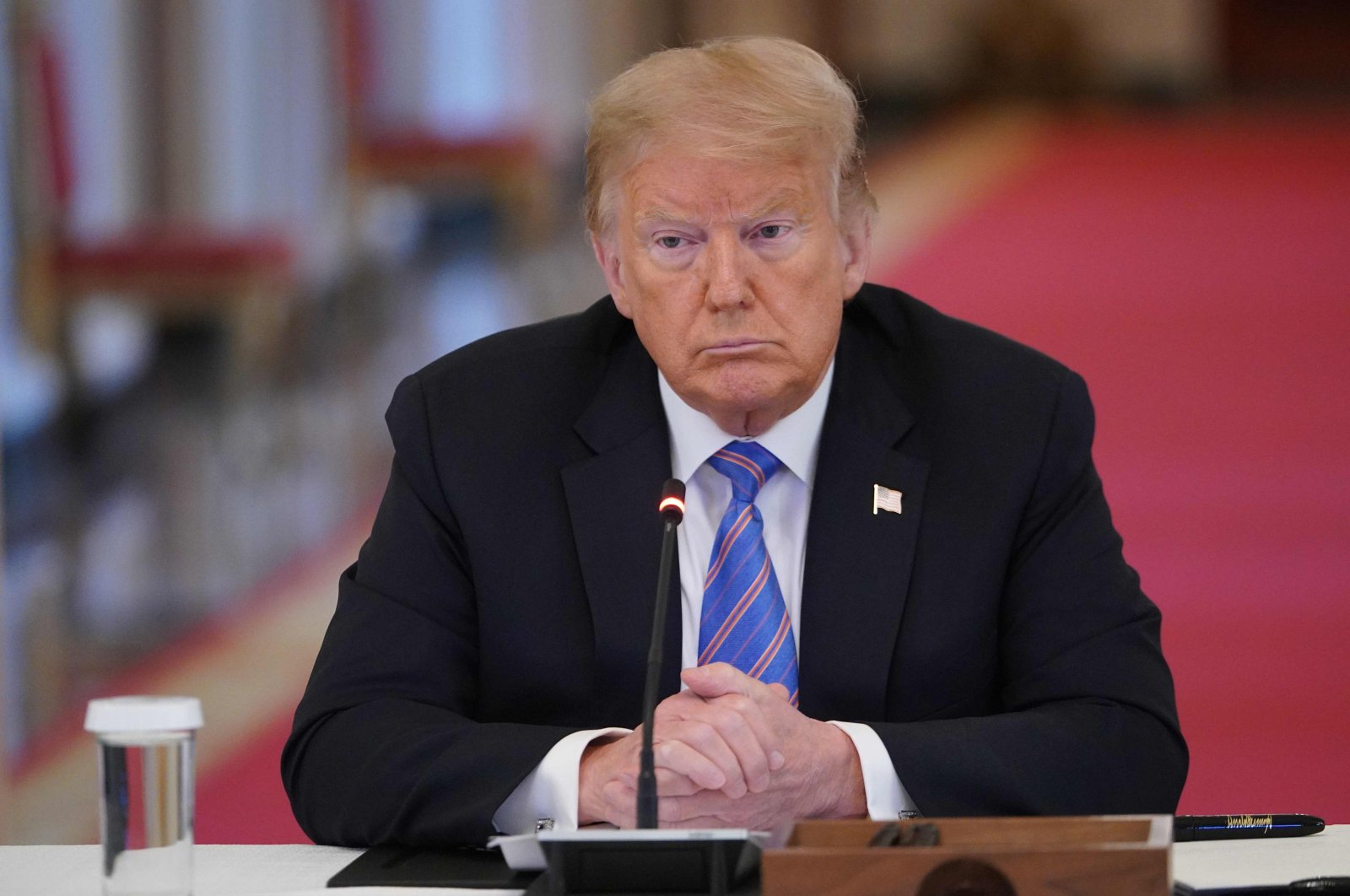 U.S. President Donald Trump looks on during an American Workforce Policy Advisory Board Meeting in the East Room of the White House in Washington, D.C., June 26, 2020. (AFP Photo)