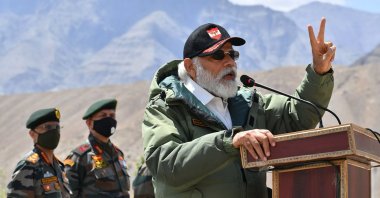 In this handout photo provided by the Press Information Bureau, Indian Prime Minister Narendra Modi adresses soldiers during a visit to Nimu, Ladakh area, India, Friday, July 3, 2020. (AP Photo)